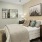 a bedroom with a bed and a fan