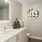 a bathroom with a mirror and sink