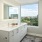 a bathroom with a large window