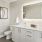 a bathroom with a large mirror