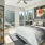 a bedroom with a bed and a book shelf